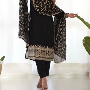 Silk Salwar Suit in Black Enhanced with Embroidered